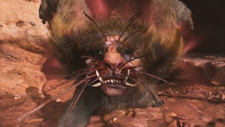 A close-up of the Mad Tiger boss's face as it roars towards the camera outside its cave in Chapter 2 of Black Myth: Wukong.