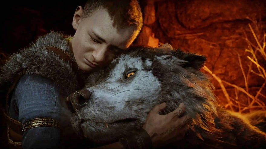 Atreus holds a dying wolf's head in his arms.