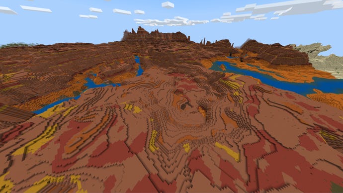 Screenshot of the 'Into the Badlands' Minecraft Seed showing an expansive Badlands biome.