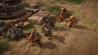 A squad of marines huddles behind cover in Menace.