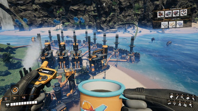 Doing some seaside factory building with a mug of coffee in one hand, in a screenshot from Satisfactory.